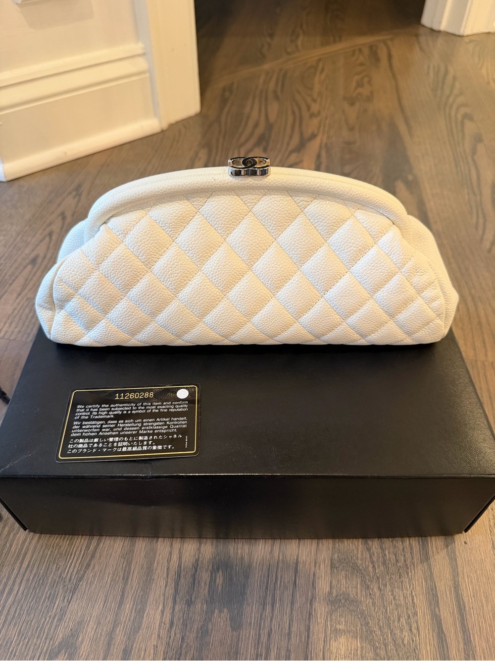 Chanel Quilted White Caviar Clutch Bag
